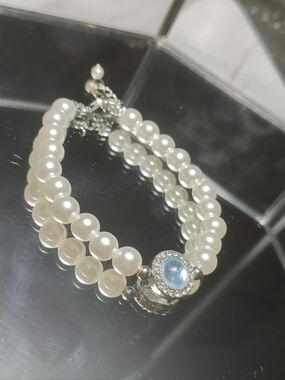 Elegant Double-Strand Pearl Bracelet with Blue Gem Accent